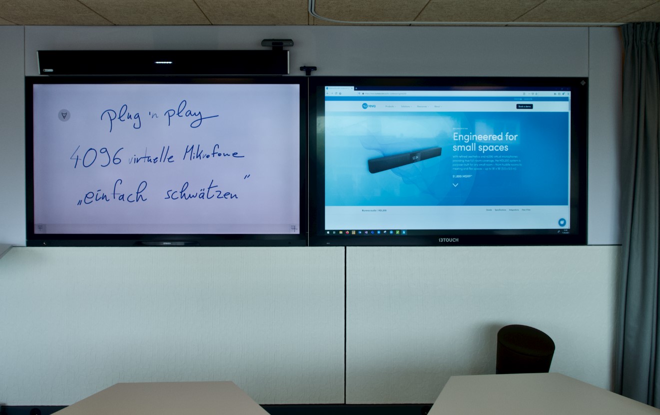 Im Meetingraum von klartext AV gibt es zwei Displays nebeneinander. Das sorgt für Übersichtlichkeit und mehr Effizienz.